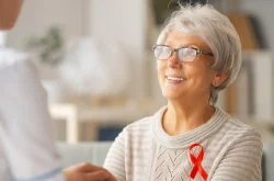 Elderly woman listening to doctor during consultation